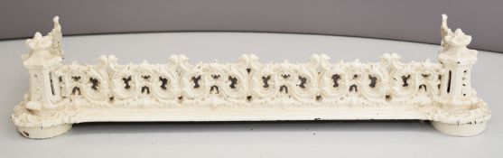 Victorian cast iron fire surround / kerb with fretwork decoration, W130 x D36cm