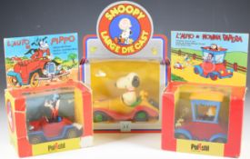 Three cartoon character diecast model cars comprising Hasbro Snoopy 72039 together with Polistil/