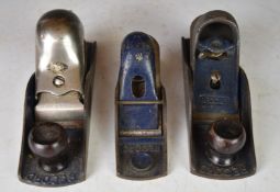 Three Record woodworking block planes comprising No 0102, 0220 and 0230