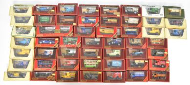 Fifty Matchbox Models of Yesteryear diecast model cars, delivery trucks etc, all in original boxes.