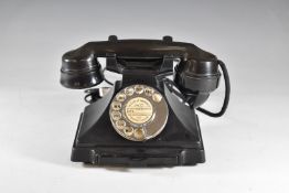 Vintage black Bakelite telephone with directory drawer below, the handset marked GPO No 164 s-32