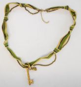 Suffragette interest knotted ribbon and chain necklace with key pendants Provenance: The vendor's