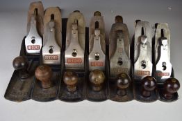 Set of Seven Record woodworking smoothing planes comprising No 07, 06, 05 1/2, 05, 04 1/2, 04 and