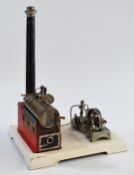 Doll & Co. live steam stationary engine on base, the boiler having faux brick chimney, whistle and
