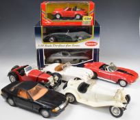 Eight 1:18 and 1:24 scale Burago, Ertl and similar diecast model cars, 3 in original boxes.