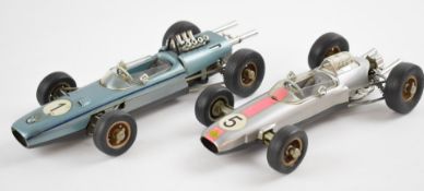 Two Schuco clockwork racing cars comprising Lotus Formula 1 No.1071 and BMW Formula  2 No.1072,