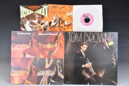 A collection of albums including Queen, Anita Baker, Simon and Garfunkel, Barry White, Dionne