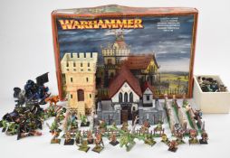 Approximately ninety Warhammer and Warhammer 40k miniatures, both metal and plastic. Armies to