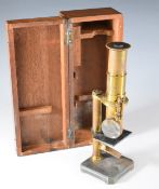 19th or early 20th century brass student's microscope, in original mahogany fitted case, length of