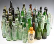 A collection of vintage beer / ginger beer bottles including Stroud, Cheltenham, Gloucester and