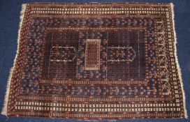 Turkoman rug signed with a central miniature gul, 175 x 132cm