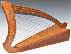 Celtic 22 string specimen wood harp with inlaid and carved decoration / detail, length 84cm x