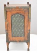Arts & Crafts oak drinks cabinet with riveted metal mounts, copper lined pen tray and stepped
