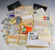 A collection of GB and world mint and used stamps in envelopes, together with two modern St