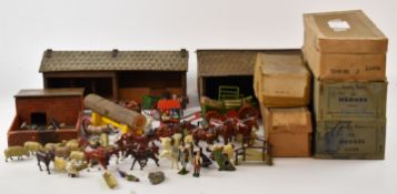 A  large collection of Britains and similar lead farm animals, vehicles and buildings.
