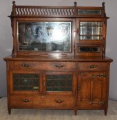 Arts & Crafts sideboard in the manner of George Walton or Liberty, the top having bevelled glass