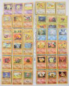 Over one hundred and fifty Base set Pokémon cards to include holos Charizard 4/102, Ninetales,