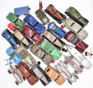 Thirty-five Dinky toys diecast model vehicles, figures and accessories including racing cars, Land