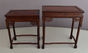 Chinese nest of two hardwood tables with fretwork friezes, W61 x D35 H 66cm