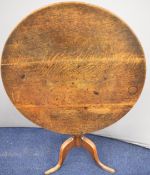 19thC oak circular tilt top table raised on triform base, diameter 82 x height 70cm