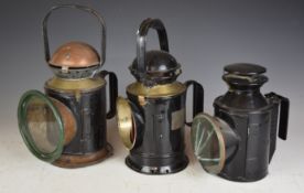 Two GWR tri colour hand lamps, one marked T.E. Bladon 1942 GWR, the other etched GWR to glass and