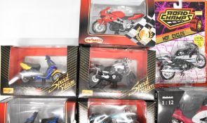 A collection of diecast motorbikes by Maisto, Guiloy, Majorette, Onyx and Matchbox, all in