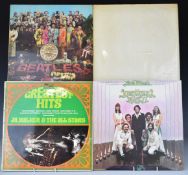 Approximately 30 albums including The Beatles