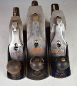 Set of three Record woodworking smoothing planes comprising No 04 1/2, 04 and 03