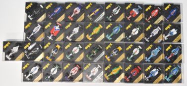 Thirty-three Onyx 1:43 scale diecast model Formula 1 and similar racing cars to include Williams