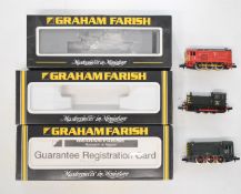 Three Graham Farish N gauge model railway diesel locomotives Class 04 and two Class 08, all in