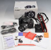 Canon EOS 7D digital SLR camera with 18-55mm 1:3.5-5.6 Canon zoom lens, in original box with cables,