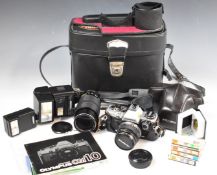Olympus OM10 35mm SLR camera outfit including Olympus 50mm 1:1.4 and Tokina 80-200mm 1:4 lenses,