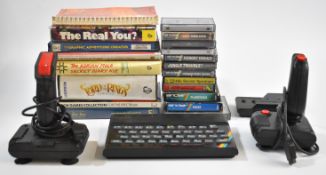 Sinclair ZX Spectrum together with a collection of software including Lord of the Rings and Adrian