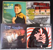 Approximately 120 albums of mixed genres plus Bob Dylan cassette box set