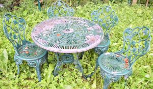Cast metal garden table and four chairs