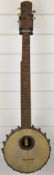 F C Wilkes 5-string long neck banjo.