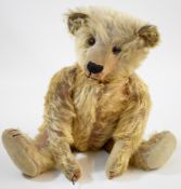 Steiff or similar Teddy bear with golden mohair, brown & black glass eyes, swivel head, jointed