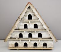 19thC or similar dovecote with shingle roof above ten pigeonholes, W98 x H83