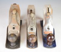 Set of three Record woodworking smoothing planes comprising No 04 1/2, 04 and 03