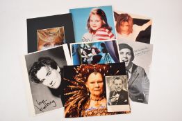 A collection of autographed / signed photographs including Judi Dench, Joanna Lumley, Norman Wisdom,