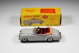 Dinky Toys diecast model Bentley Coupé with grey body, maroon interior, driver and suspension,
