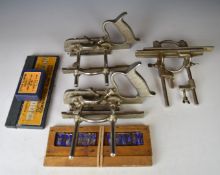 Three Record 050 combination woodworking planes, some with cutters