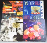 Approximately 100 albums and 12