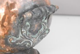 Hammered copper helmet shaped coal scuttle and light fittings with drop lustres