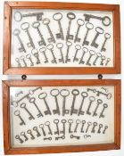 Two framed displays of vintage keys, largest key approximately 14cm long, each case 35 x 57cm.
