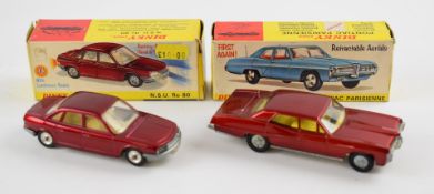 Two Dinky Toys diecast model vehicles Pontiac Parisienne with retractable aerials, red body and