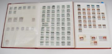 Two red stockbooks with a large quantity of GB stamps, mostly Queen Victoria and King Edward VII,