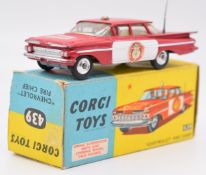 Corgi Toys diecast model Chevrolet Impala 'Fire Chief' with red/white body, silver hubs, aerial