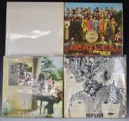 A collection of 12 albums comprising The Beatles - White Album, Sgt Pepper and Revolver, Pink