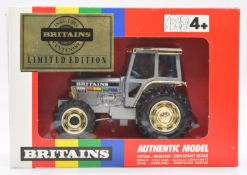 Britains Limited Edition 1:32 scale diecast model tractor with grey body, gold roof and hubs and red